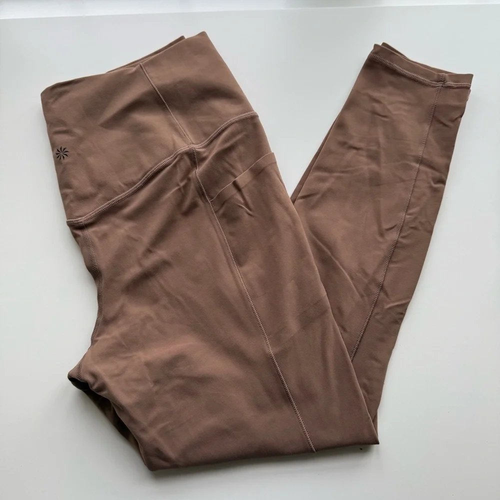 Athleta Salutation Stash Tight Size Large